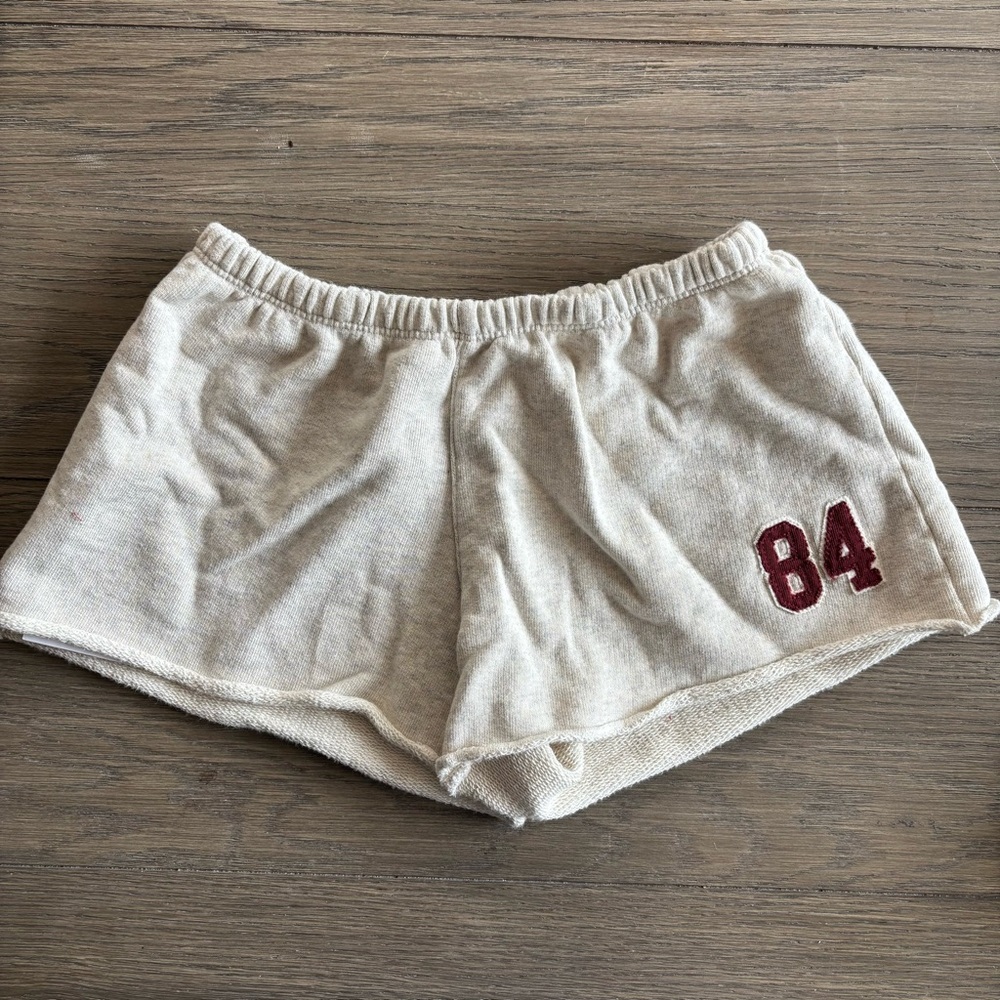 Brandy Melville Cream Athletic Shorts with Maroon Detail